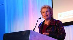 Bush Foundation Board Chair Pamela Moret acts as emcee for the event.