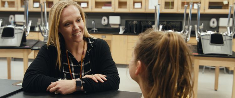 Teacher and student talking