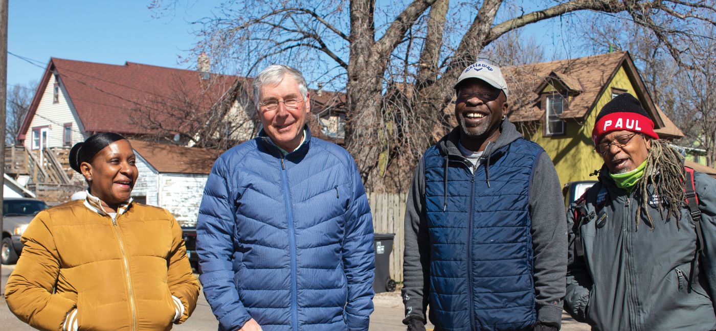 Temali with members of NDC partner organization Community Stabilization Project, a housing advocacy group in St. Paul