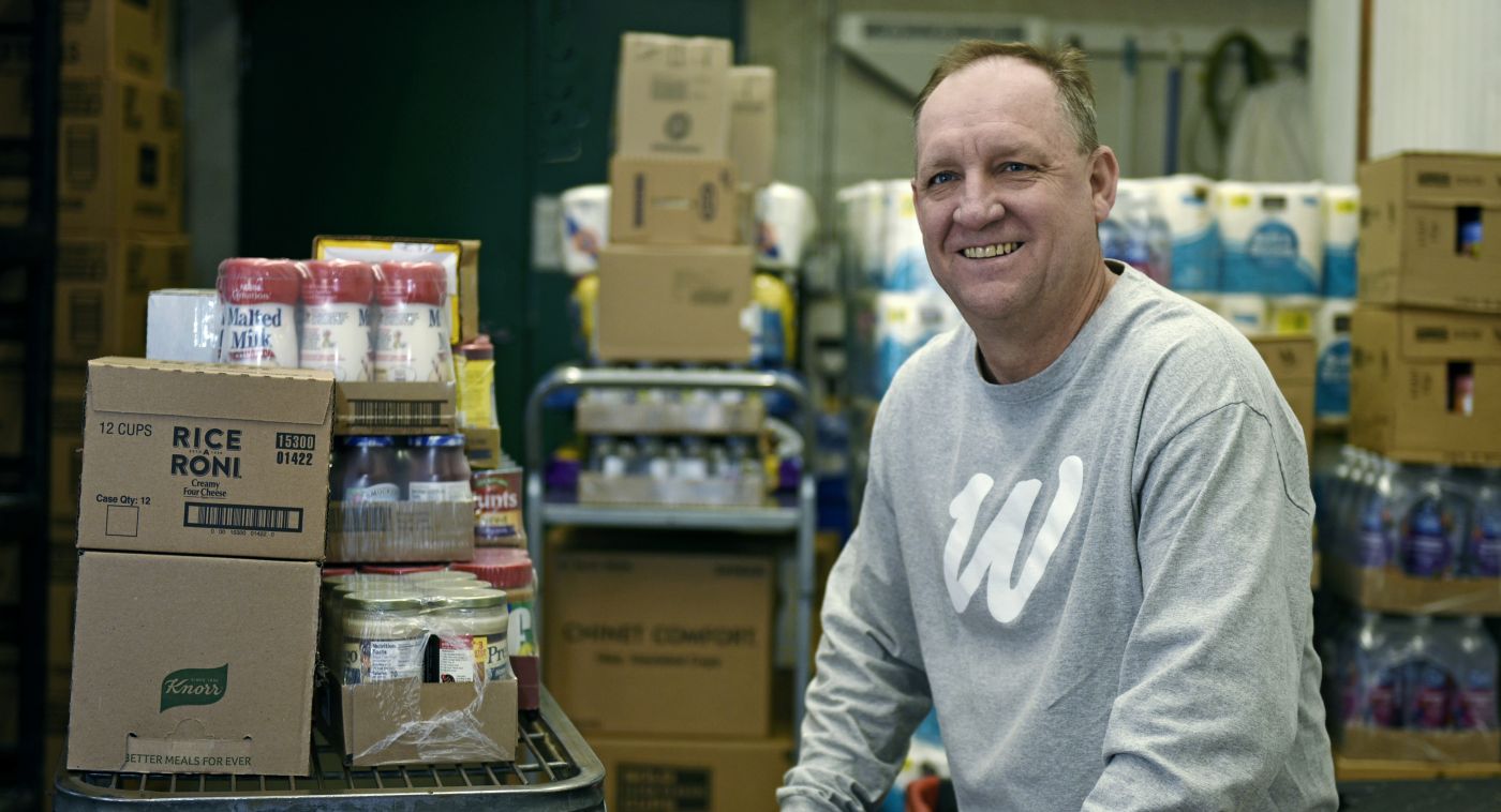 Rural Access Distribution Board member Steve Wells in a distribution storage area owned co-op in Park River, North Dakota.