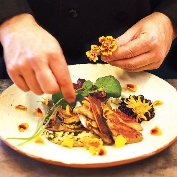 Sean Sherman preparing traditional food