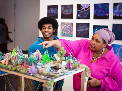 People enjoying art.