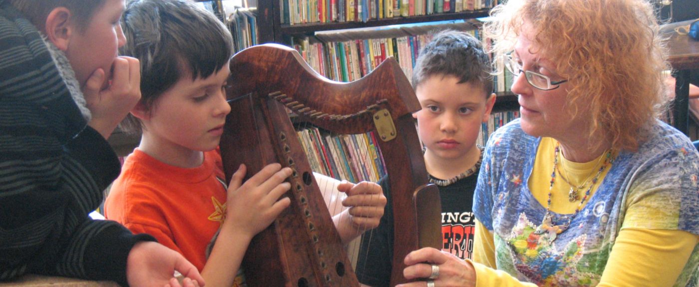 Music teacher with children