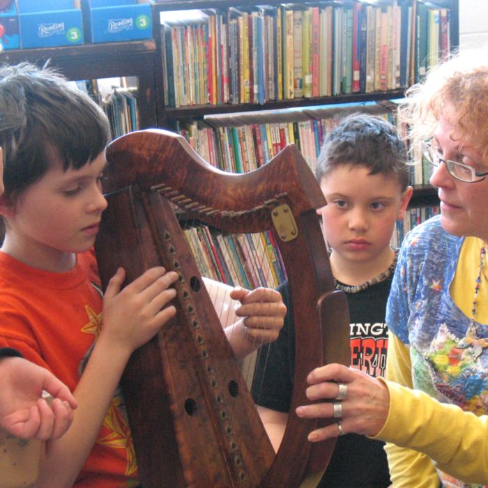 Music teacher with children